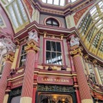 Leadenhall Market featuring The Lamb Tavern and Old Tom's Bar.