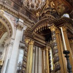 The interior of St Paul's Cathedral in London England looking north east from the choir toward the high altar.