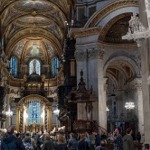 The Apse, High Altar, and part of the south transept of St Paul's Cathedral in London England.