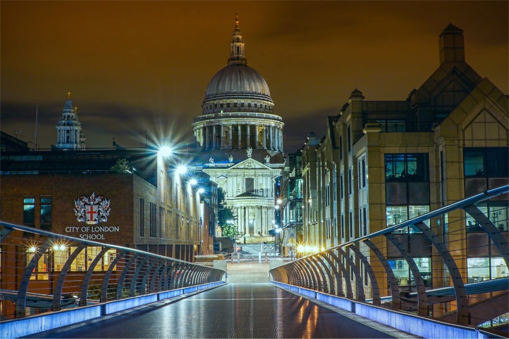 The Millennium Bridge looking down Peter's Hill pedestrian walkway and Sermon Lane to St Paul's Cathedral.