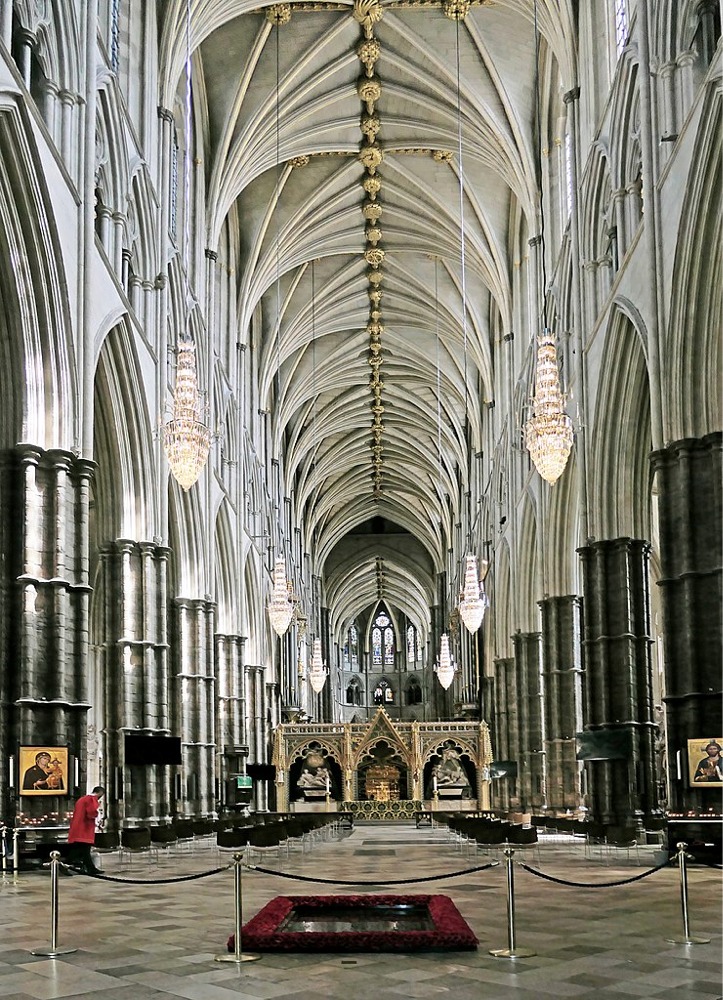 Westminster Abbey's Nave and vault ceiling exhibit gothic architecture, and we also see Sir Isaac Newton's monument and choir screen.