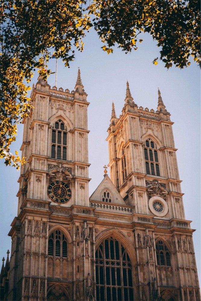 Westminster Abbey's western facade on a sunny day in London, England.