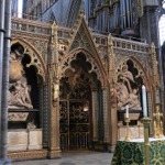 The choir screen and monument to Sir Isacc Newton whose grave is in front of the screen.