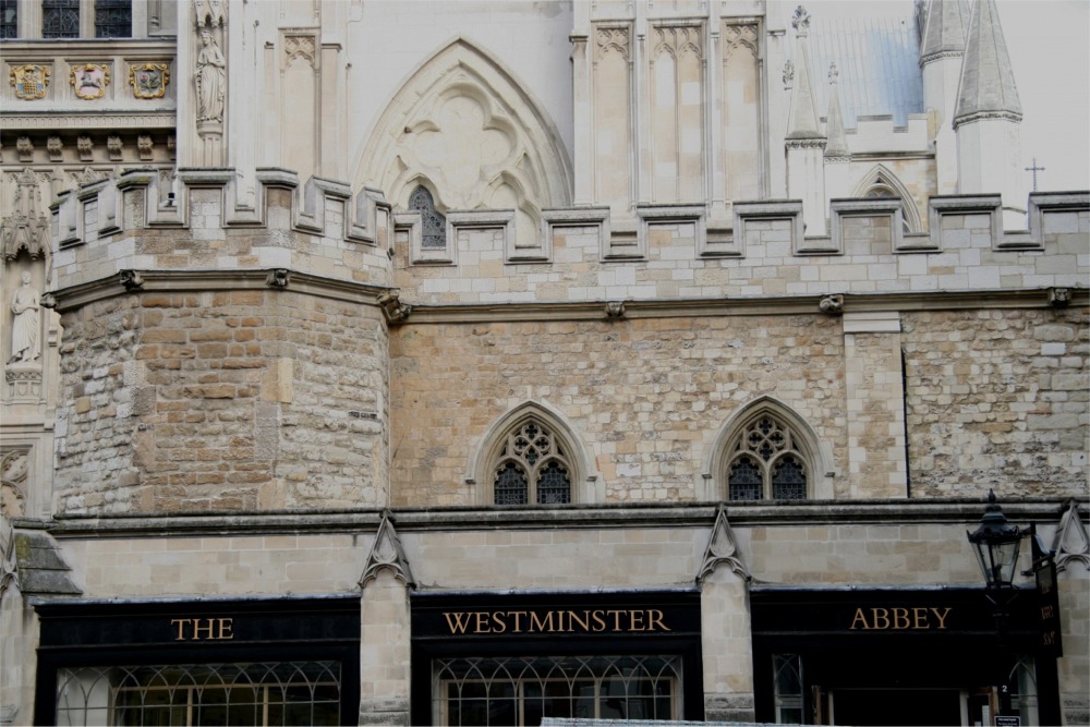This is a lovely photograph of a Westminster Abbey sign. The photo captures a smorgasbord of architectural detail at the Abbey.