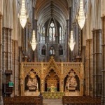 Gothic architecture in the Nave and the vault ceiling, plus the choir screen and monument to Sir Isacc Newton in Westminster Abbey, London, England.
