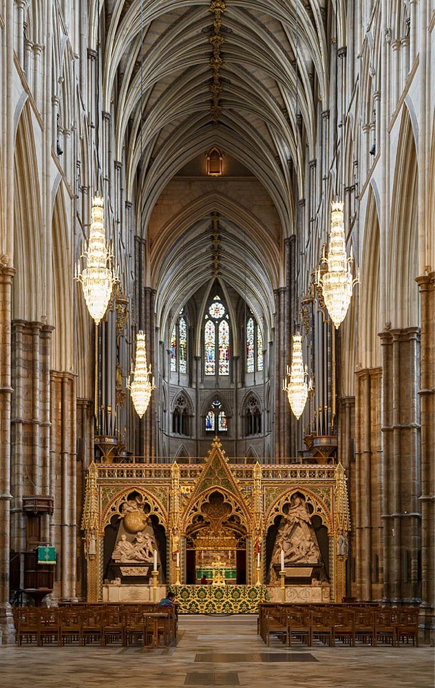 The gothic architecture in the Nave and vault ceiling of Westminster Abbey, London, England. The choir screen and monument to Sir Isacc Newton.