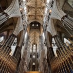 Westminster Abbey in London, England including the Quire, the ribbed vault ceiling, and the intersection of the North and South Transepts.